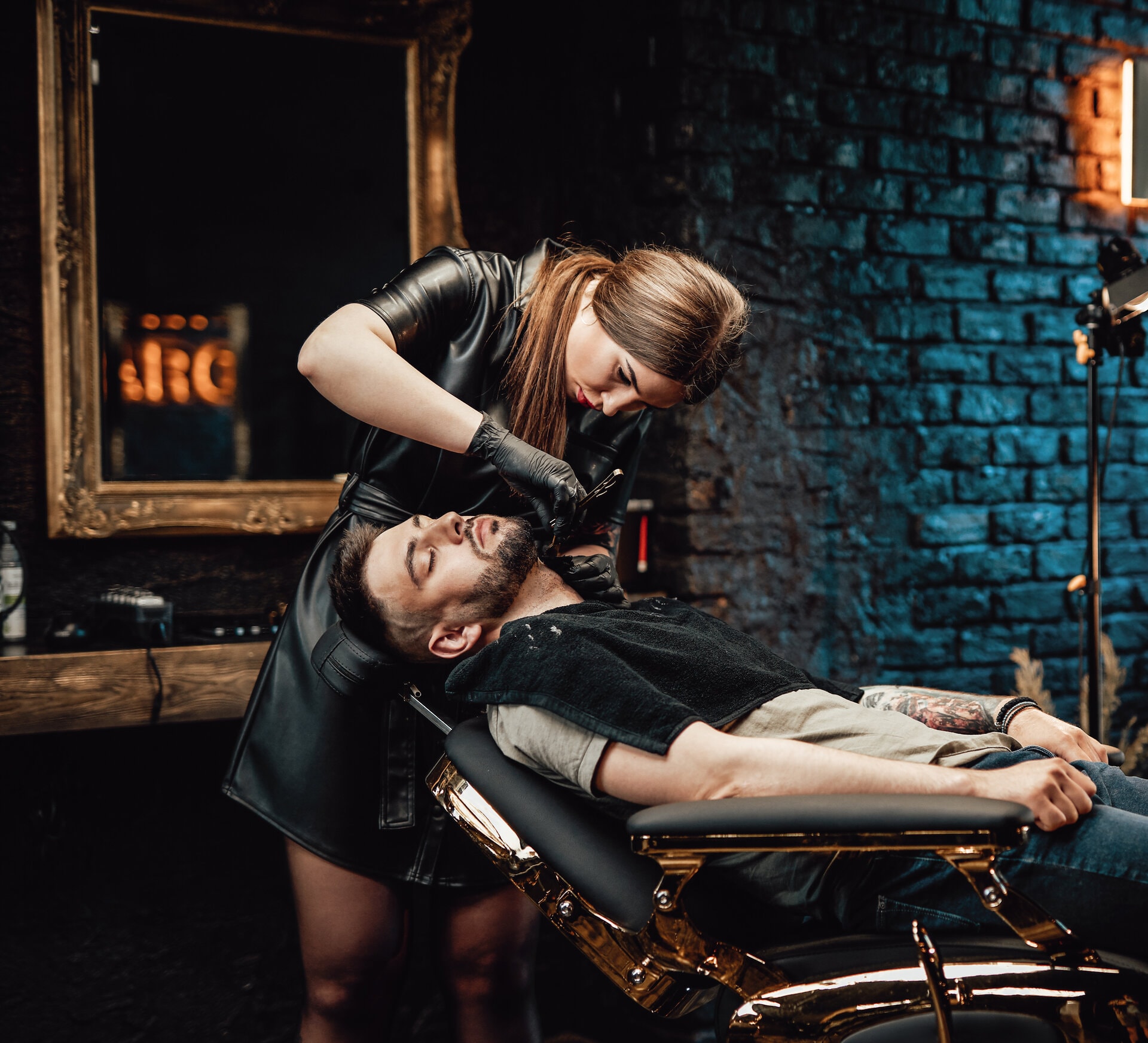 skillful-barber-carefully-cutting-a-beard-of-clien-2021-08-29-11-43-03-utc (2) (1)